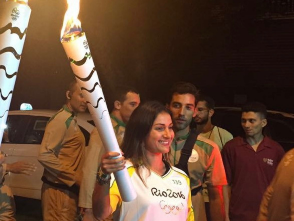 Marina Izidro with the Olympic Torch in Rio.